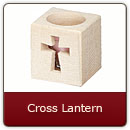 Cross Lantern - Carved limestone votive holder with cross design.