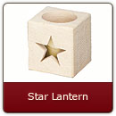 Star Lantern - Carved limestone votive holder with star design.